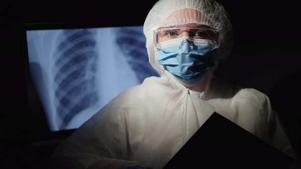 Portrait of a Woman in Medical Protective Uniform