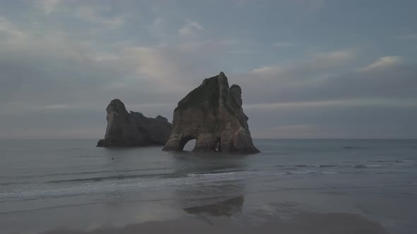 Rock with archway in the sea