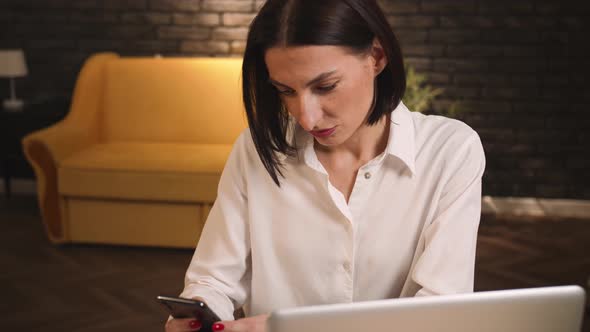 Pretty Tired Caucasian Woman Yawning While Using Phone Communicates Browses Watching Content Social