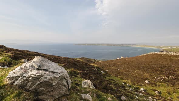 Time Lapse of coastal landscape during a blue sky day on Wild Atlantic Way in Ireland.