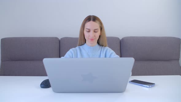 Entrepreneur working on notebook computer at home during lockdown in 4k video