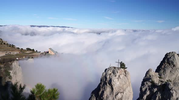 Aerial View of Thick Fog Like Beautiful Ocean of Clouds and Mountain Peaks Above Clouds