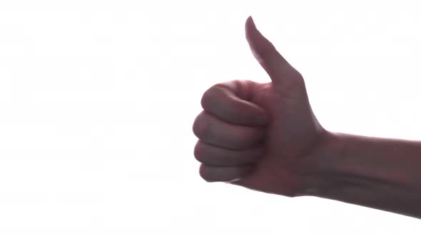 Person does hand gesture with bright white backdrop 24