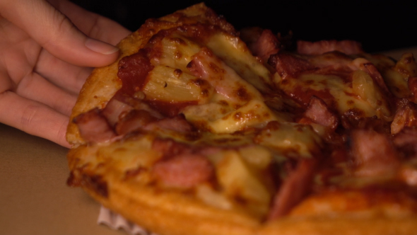 Hand Holding Pizza alt