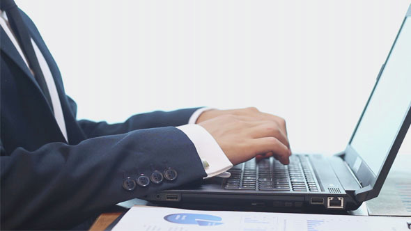 Businessman Working on the Computer in the Office alt