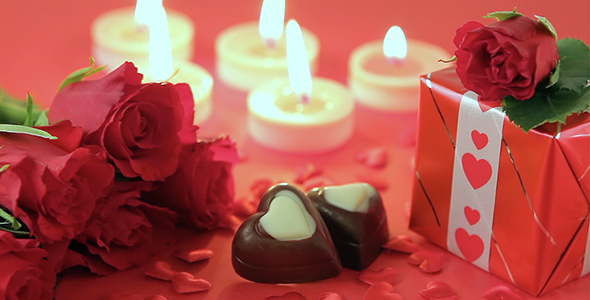 Red Roses and Chocolate Candies on Red 2