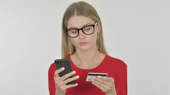 Online Shopping on Smartphone by Young Woman on White Background