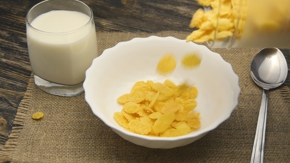 Cornflakes Pouring Into Bowl In 
