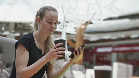 Charming Girl in Cafe in Mall