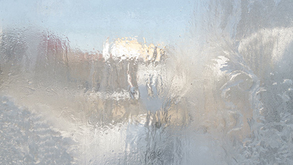 Frost Pattern Melting On Window