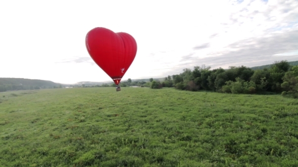 Aerial View Of Red  Hot Air Balloon