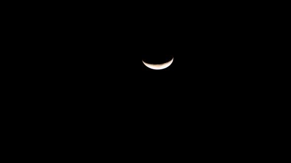The Crescent  Moon In Dark Night