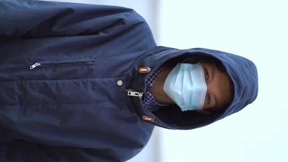 Boy Medical Mask on His Face During Quarantine Stands on Beach During the Second Wave Quarantine