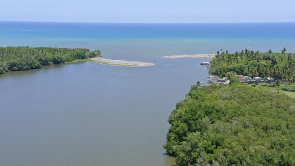 Soco river mouth, San Pedro de Macoris in Dominican Republic. Aerial drone panoramic view