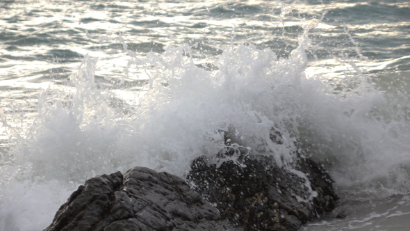 Sea Waves Splashing On Rock