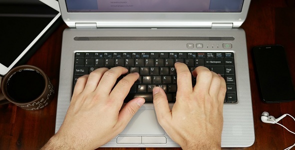 Freelancer Working On Laptop Computer