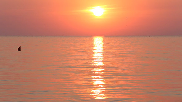 Sunrise (Sun In Sky And Sun Track On Sea Water Surface). 