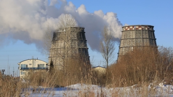 View Of Power Heat Station, Smoke From The Chimney On Frosty Winter Day