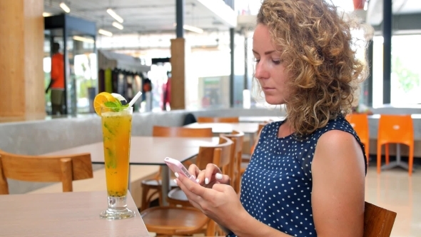 Cafe City Lifestyle Woman With Juice Using Phone 
