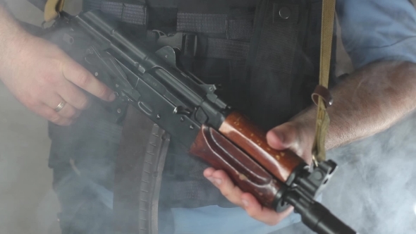 A Policeman With a Machine Gun alt