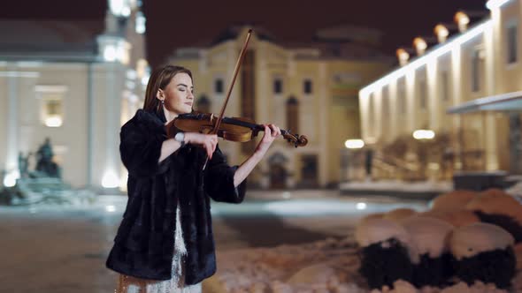 A Talented Girl Performs Composition on the Instrument