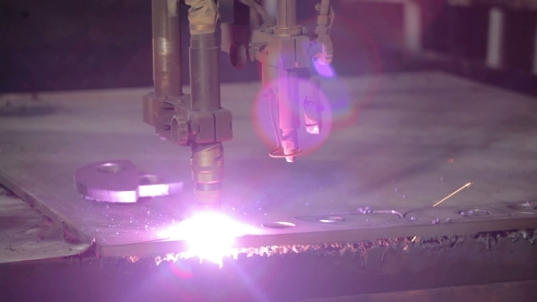 Industrial Laser Is Cutting a Steel Sheet