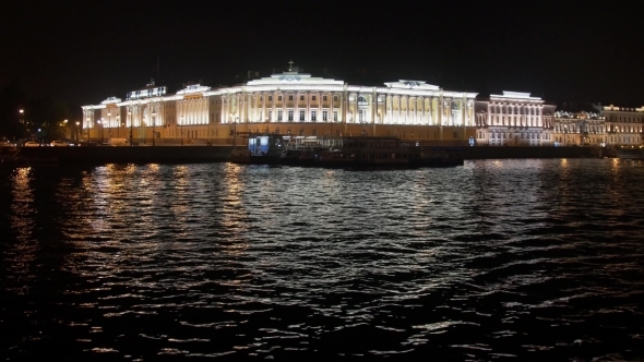 Pier And Illuminated Architecture from the River