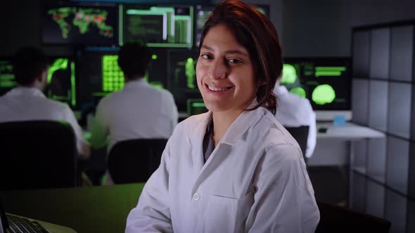 Female Medical Smiling Doctor Looking at the Camera