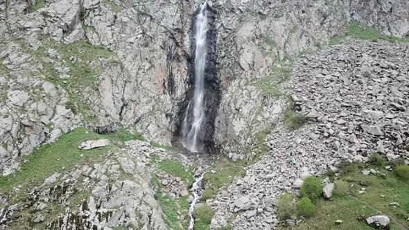 High Waterfall Among the Rocks