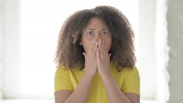 Disappointed African Woman Reacting to Loss