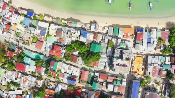 Top View of Houses with Red Roofs Near the Sea and Harbort Port in El Nido, Palawan, Philippines