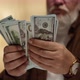 gray-haired man counting dollars close-up - VideoHive Item for Sale