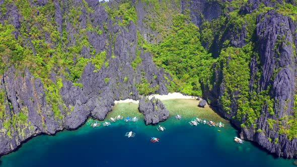 Beautiful Tropical Island and Secret Paradise Beach Lagoon on Miniloc in the El Nido Archipelago