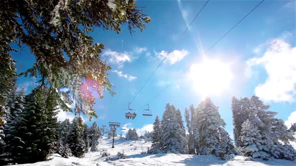 Ski Lift And Snowy Mountain
