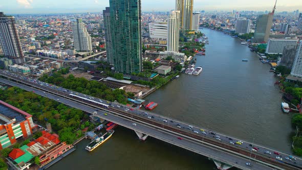 4K UHD : Bangkok River drone view. Flying over the Chao Phraya River