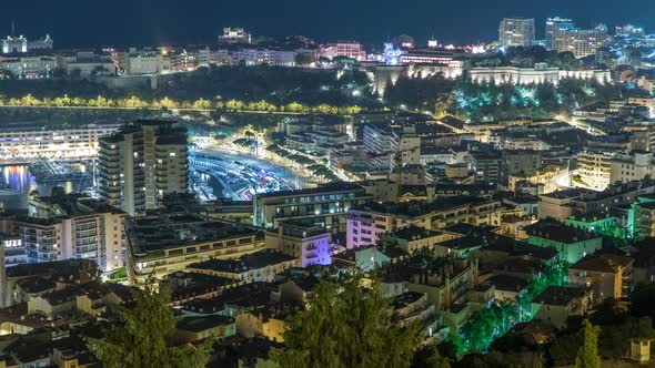 Cityscape of Monte Carlo Monaco Night Timelapse with Roofs of Buildings and Traffic on Roads