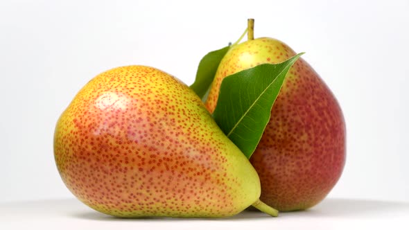 Pears rotating on white background