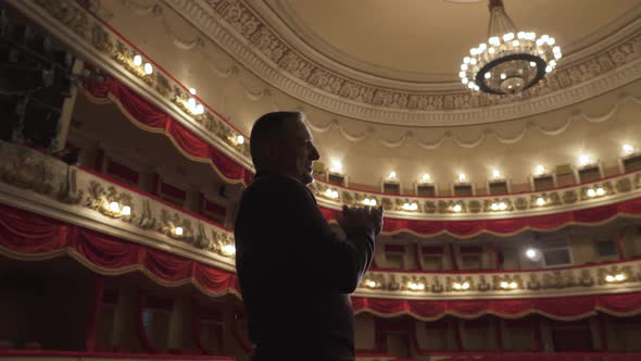 Actor on the stage of the theater. StandUp comedy concert.