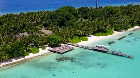 Aerial drone sky of exotic seashore beach by blue lagoon and sand background