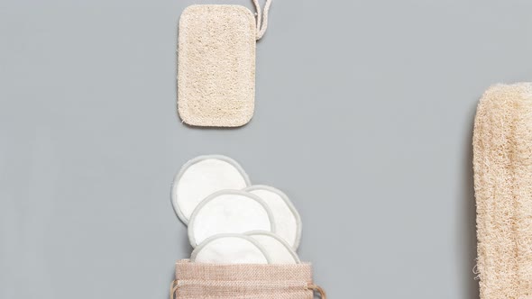 Top view of different hygiene and beauty items on grey background.  Eco friendly Zero waste concept.
