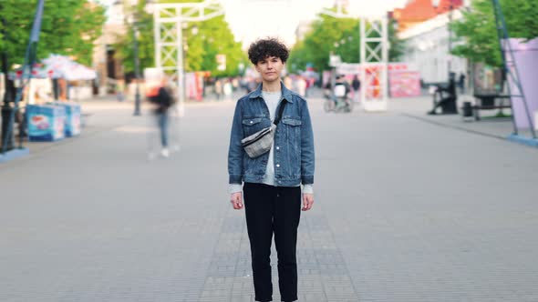 Zoom-in Time Lapse of Attractive Girl Hipster Standing Alone in Busy Street