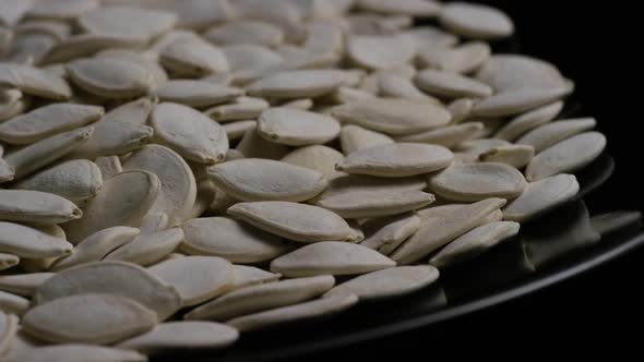 Cinematic, rotating shot of pumpking seeds - PUMPKIN SEEDS 038