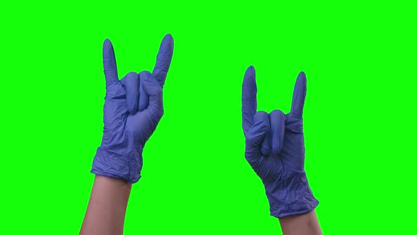 Doctors Female Hand in Blue Glove Are Showing Sign Rock, Cool, Green Screen