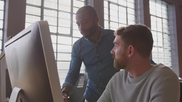 Young creative professionals working in a modern office