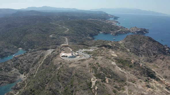 Aerial View of Lighthouse on Top of Rocky Hill