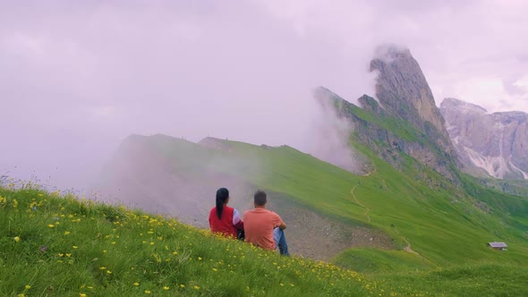 Couple on Vacation Hiking in the Italien Dolomites Amazing View on Seceda Peak