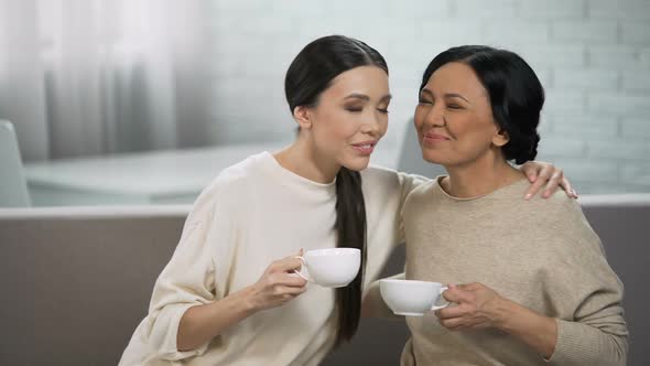 Female Friends Having Tea, Private Conversation Between Mother and Daughter