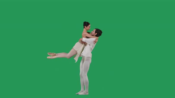 Professional Ballet Pair Practicing Moves on Green Screen