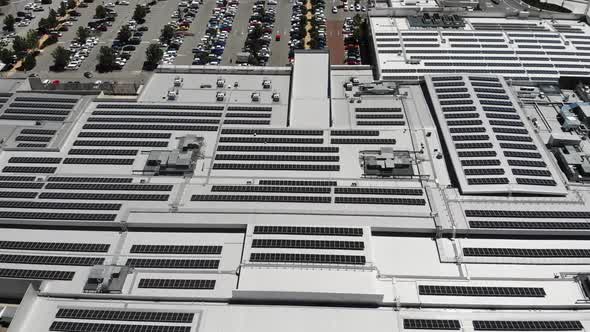 Aerial View of a Building with Solar Panels