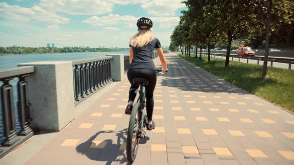 Cyclist Happy Cycling Travel Woman On Helmet On Bicycle.Girl Helmet Cycling On Bike Sport Recreation